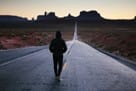 a mman walking in the big load