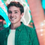 a young man in the light up city